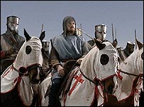 Men on horseback dressed as Crusaders